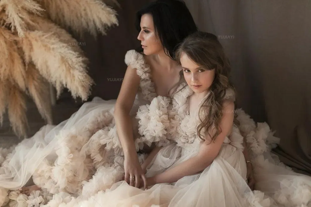 Elegant tiered ruffle tulle Mommy and Me matching dresses, perfect for mother-daughter and family photoshoots.